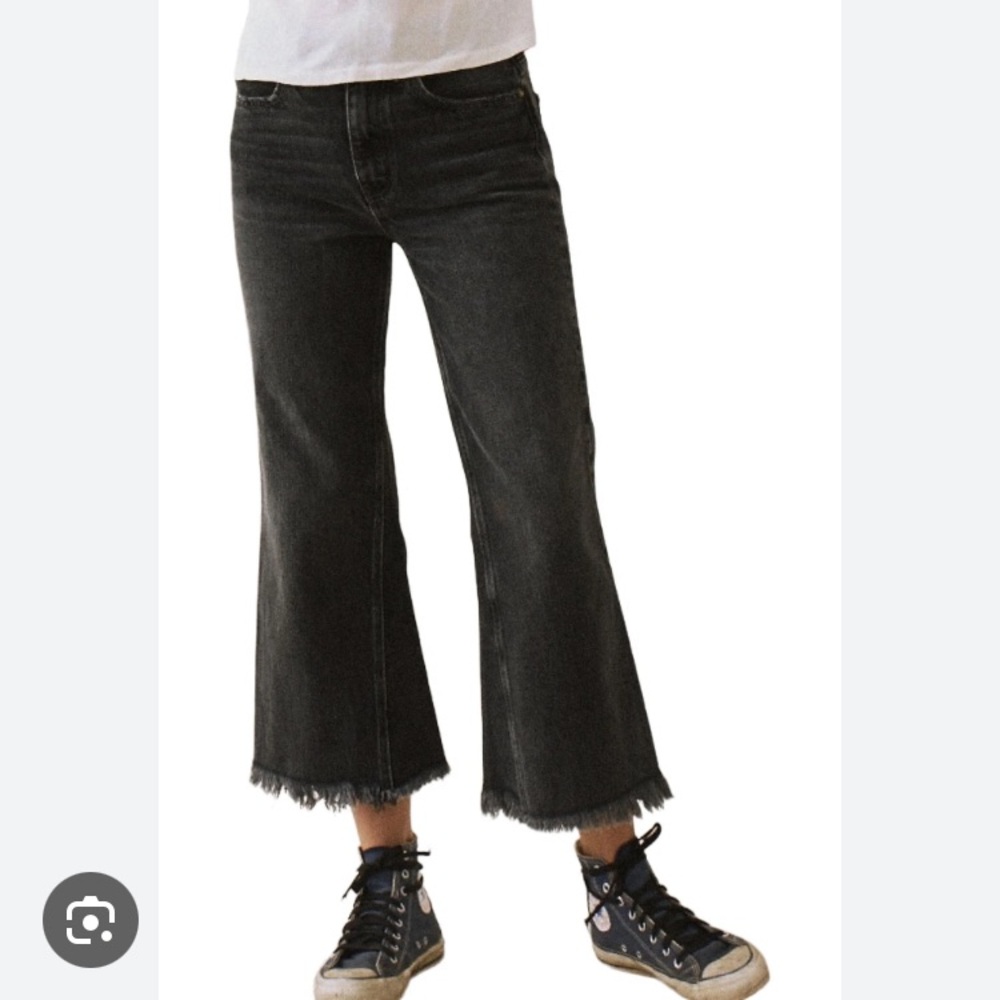 THE GREAT. Washed black Kick Bell Jeans